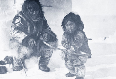 Photo of Eskimo child learning to hunt from Nanook of the North.